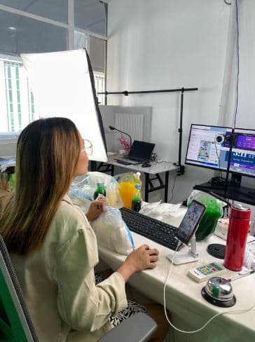 Host prepares yellow products at the livestream desk